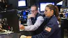 US opens lower as trade war continues