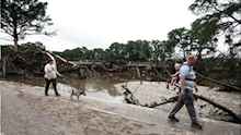 Texas floods kill at least 70 as search continues