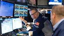 Wall Street closes lower over trade uncertainty